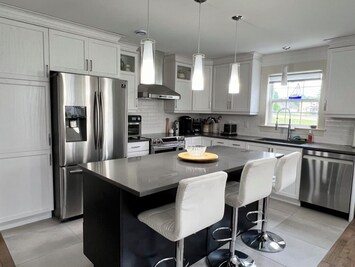 Includes stainless steal fridge, stove and dishwasher