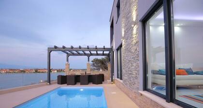 Brand new amazing sea front villa with pool for up to 10 people