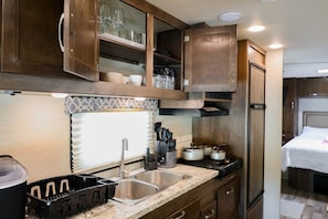 Villa | Private kitchen | Full-size fridge, microwave, oven, stovetop