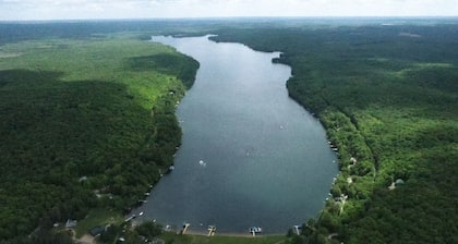 Cozy cottage on Lake Lucerne in Crandon, Wi. Home of the Crandon Brush Run !