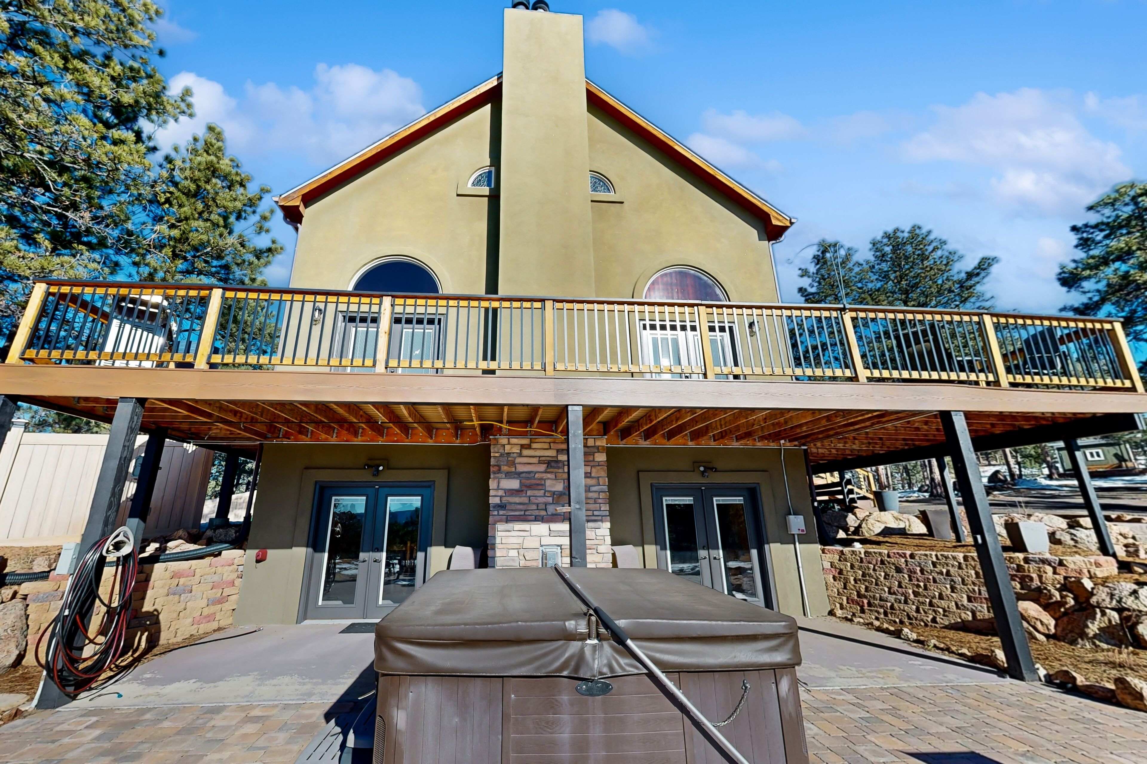 Secluded mountain-view home with private hot tub, fireplace, & chef's kitchen