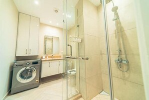 Hair dryer, towels, soap, shampoo