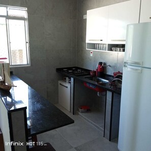 Fridge, microwave, stovetop, cookware/dishes/utensils