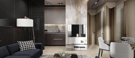 Departamento Deluxe | Área de sala de estar | Smart TV de 50 pulgadas con canales por cable
