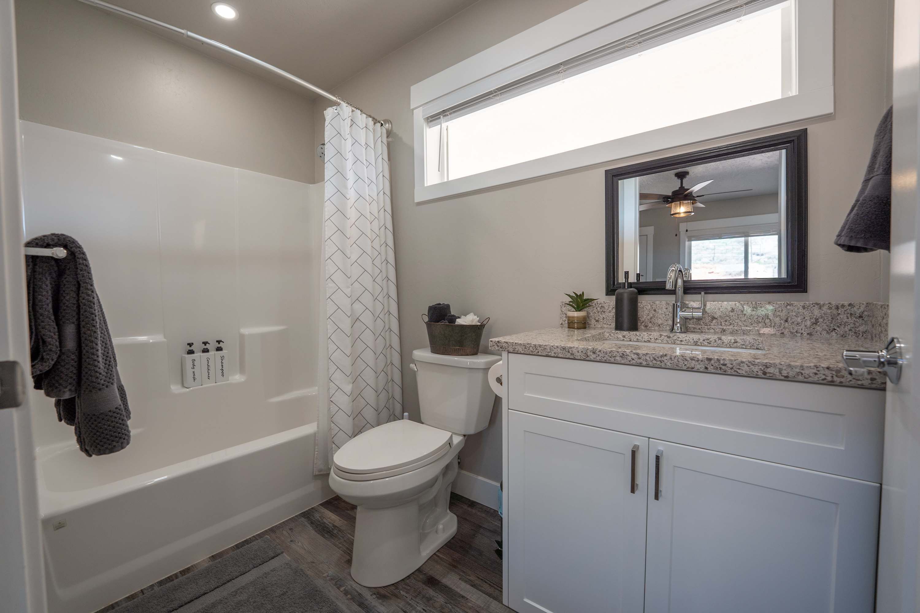 Shower, hair dryer, towels, shampoo