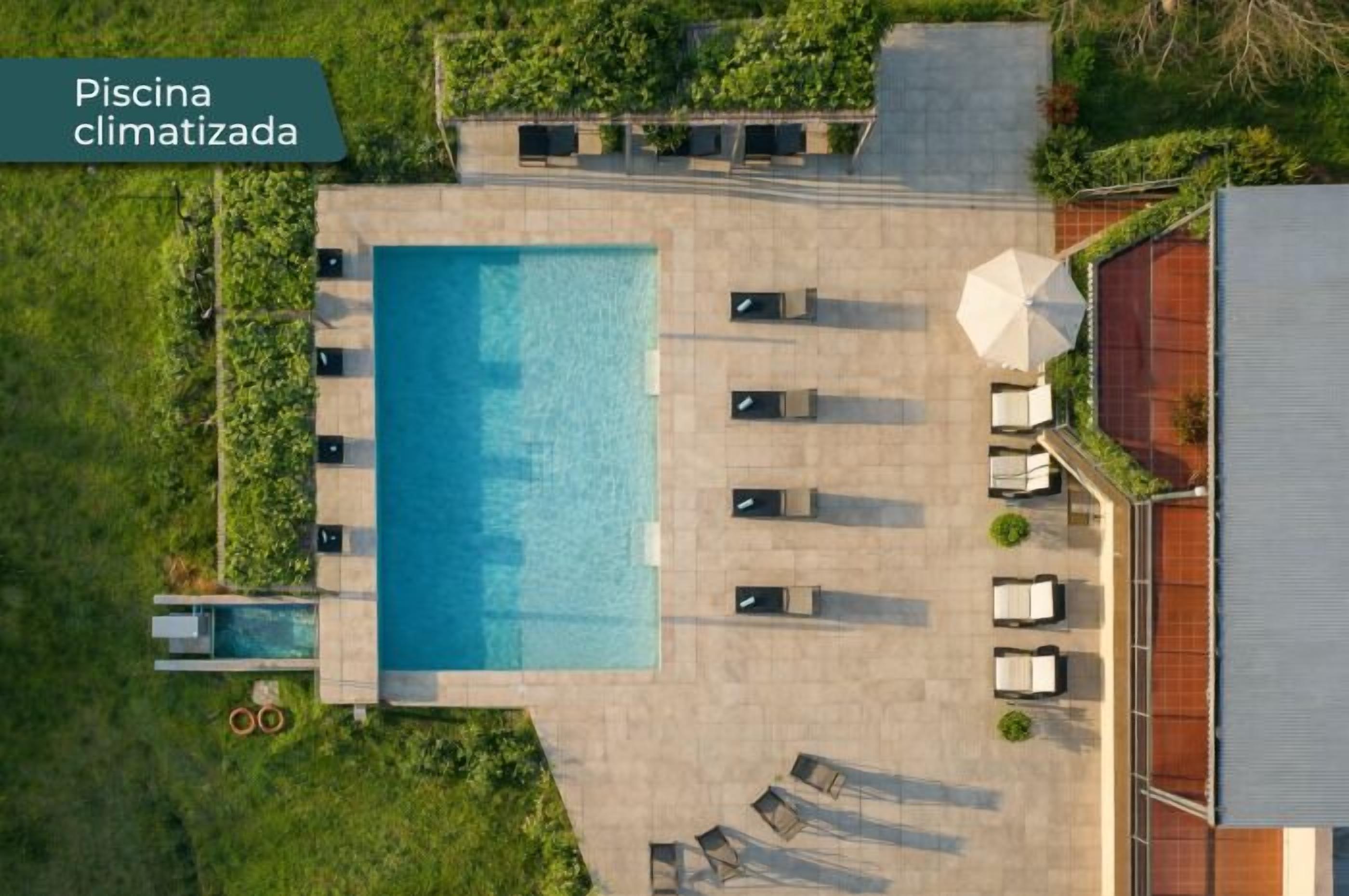 Seasonal outdoor pool, pool umbrellas, pool loungers