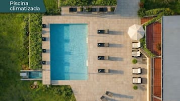 Seasonal outdoor pool, pool umbrellas, pool loungers