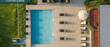 Seasonal outdoor pool, pool umbrellas, pool loungers