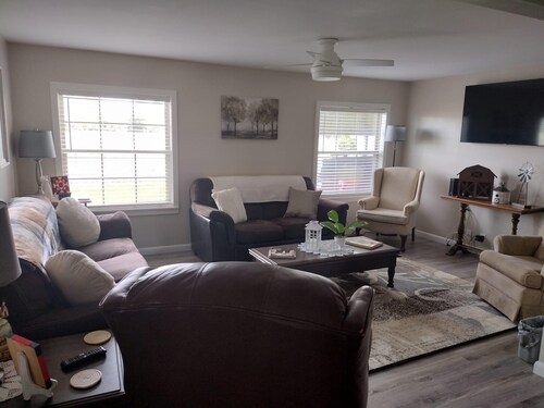 The Farmhouse. Quiet, modern. Family Friendly.  Short drive to the beach! 