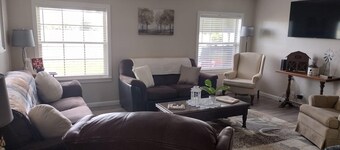 The Farmhouse. Quiet, modern. Family Friendly.  Short drive to the beach! 