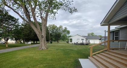 The Farmhouse. Quiet, modern. Family Friendly. Short drive to the beach!