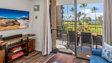 Luxury Condo, Multiple Beds, Ocean View, Beachside | Living area | 700-inch Smart TV with cable channels