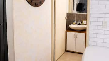 Shower, towels, soap, toilet paper
