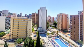 A high-rise building with a pool area, surrounded by other residential buildings. - Amsterdam Playa Levante by Interhome (Benidorm)