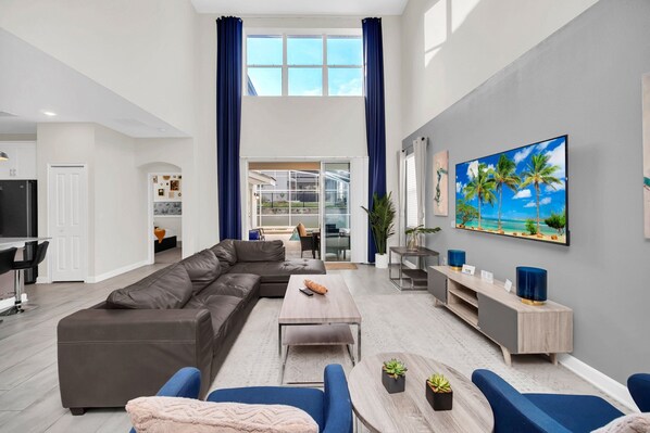 TV, table football - Charming Oasis | 5 BR, Game Room, Screened In Private Pool & Spa (Davenport)