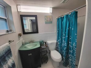 Shower, towels, soap, shampoo