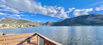 Original charmer with expansive waterfront deck, dock, fireplace - walkable area