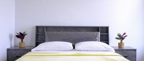 2 عدّة غرف نوم ومكواة/لوح كي وواي فاي مجانًا وملاءات أسرّة