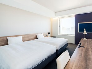 Deluxe Quadruple Room, Non Smoking | Free WiFi, bed sheets