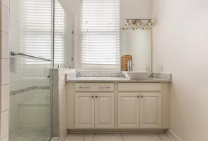 Shower, hair dryer, towels