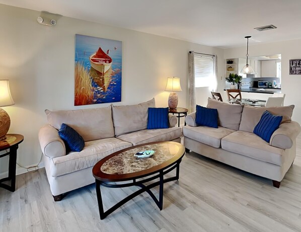 House, Multiple Beds, Patio, Garden View | Living area | 43-inch TV with cable channels - Sunrise Suite (Fort Myers Beach)