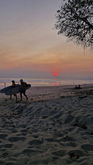 Beach nearby, white sand, surfing