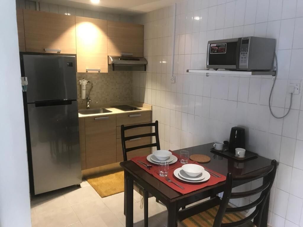 Comfort Apartment | Private kitchen | Full-size fridge, microwave, stovetop, electric kettle