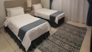 1 غرفة نوم وستائر تعتيم ومكواة/لوح كي وواي فاي مجانًا