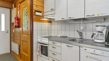 Een koelkast, een microgolfoven, een vaatwasser, een broodrooster