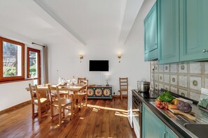 Familie appartement, meerdere slaapkamers (Garden Home) | Dineerruimte