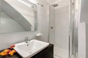 Shower, bidet, towels, soap