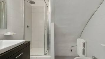 Shower, bidet, towels, soap