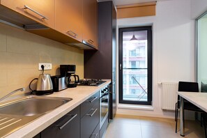 Mikrobølgeovn, ovn og kokeplater