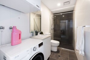 Shower, eco-friendly toiletries, hair dryer, towels