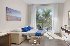 1 habitación, escritorio, tabla de planchar con plancha y cuna de viaje 