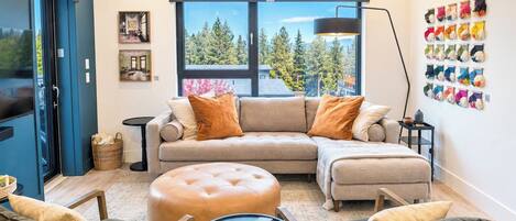 This corner unit features expansive mountain views