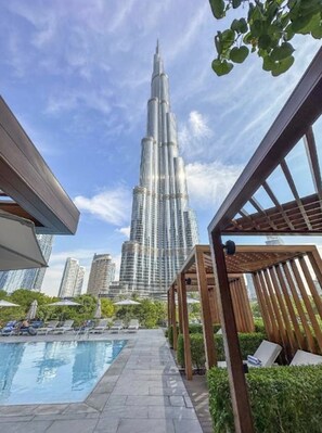 Outdoor pool, pool umbrellas, sun loungers