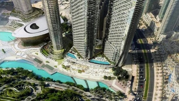A high-rise building complex with multiple skyscrapers, a central plaza, and a large pool. - EDEN'S Homes & Villas - Address Opera District Residences (Dubai)