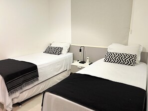 3 habitaciones, tabla de planchar con plancha, wifi y ropa de cama 