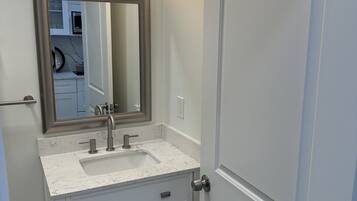 Shower, towels, soap, toilet paper