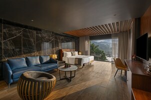 Suíte superluxo | Área de estar | TV LED 42 polegadas com canais a cabo