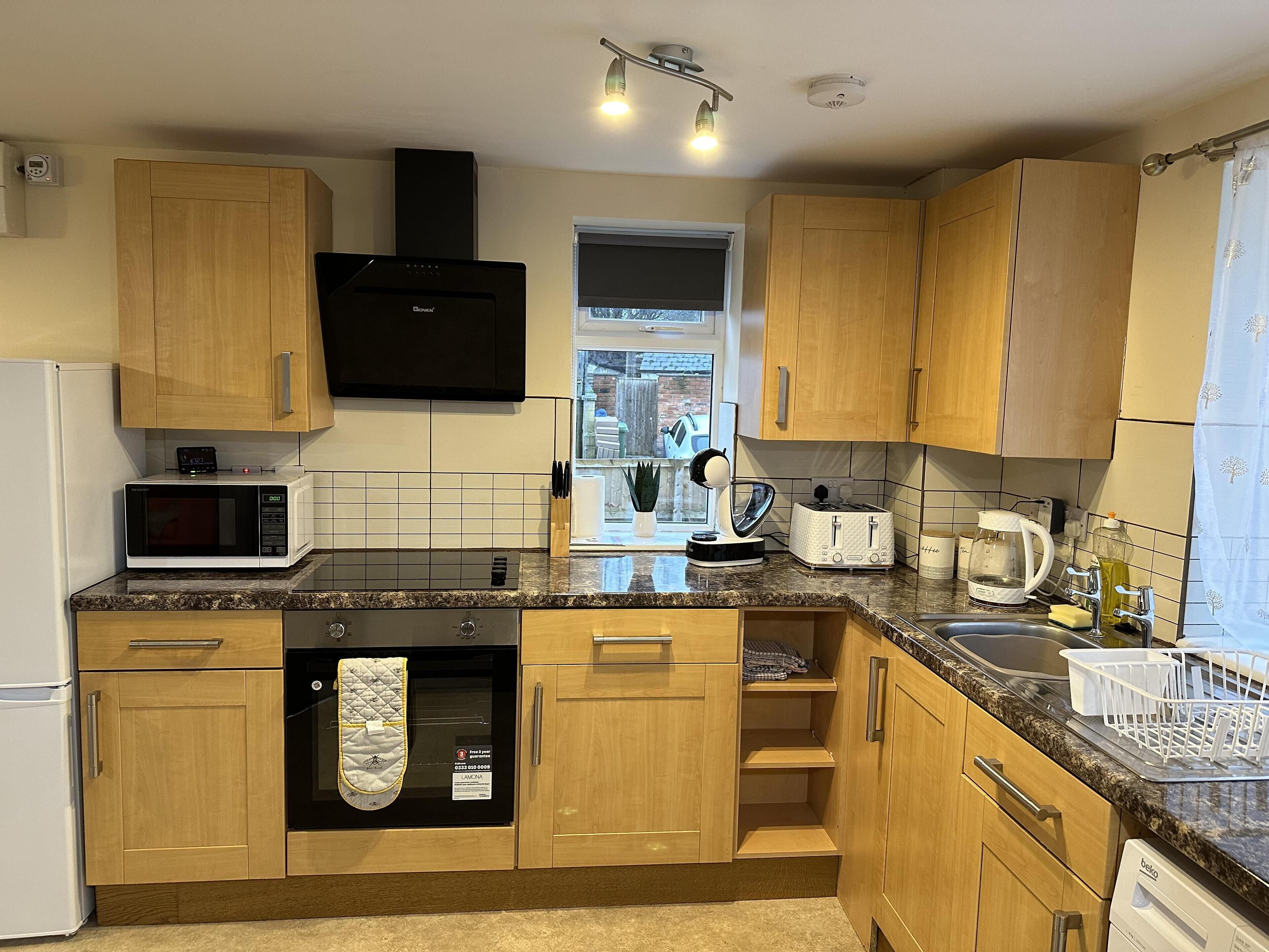 Apartment | Private kitchen | Fridge, microwave, oven, stovetop