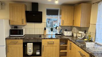 Apartment | Private kitchen | Fridge, microwave, oven, stovetop