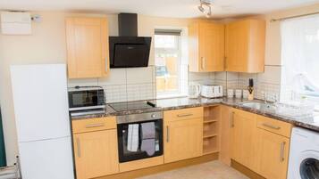 Apartment | Private kitchen | Fridge, microwave, oven, stovetop