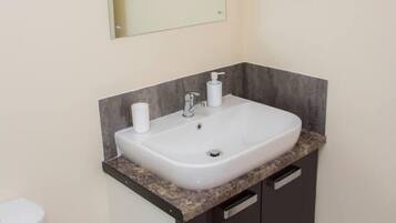 Apartment | Bathroom | Combined shower/tub, deep soaking tub, hair dryer, towels