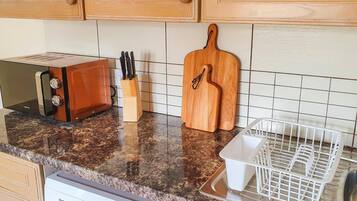 Apartment | Private kitchen | Fridge, microwave, oven, stovetop