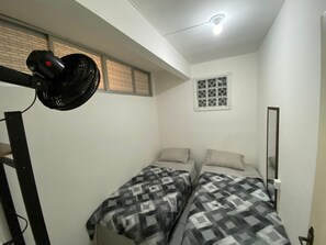 Departamento básico | 2 habitaciones, wifi gratis y ropa de cama 