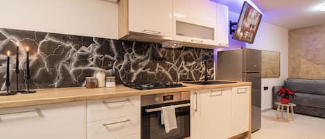 Family Apartment, Multiple Bedrooms (Wellness & Relax Apartment Lilly) | Private kitchen | Fridge, microwave, oven, stovetop