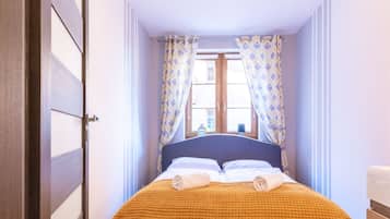 Departamento clásico | 1 habitación, tabla de planchar con plancha, wifi gratis y ropa de cama