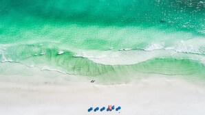 A beach with clear turquoise water and white sand. - 5-Bedroom WaterColor Home | Breathtaking Gulf & Lake Views | Beach Steps Away (SANTA ROSA BEACH)